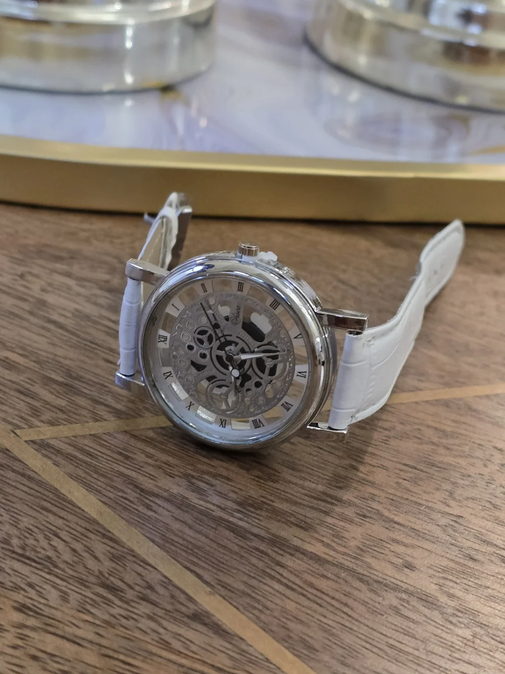 White Strap Silver-Tone Skeleton Mechanical Watch